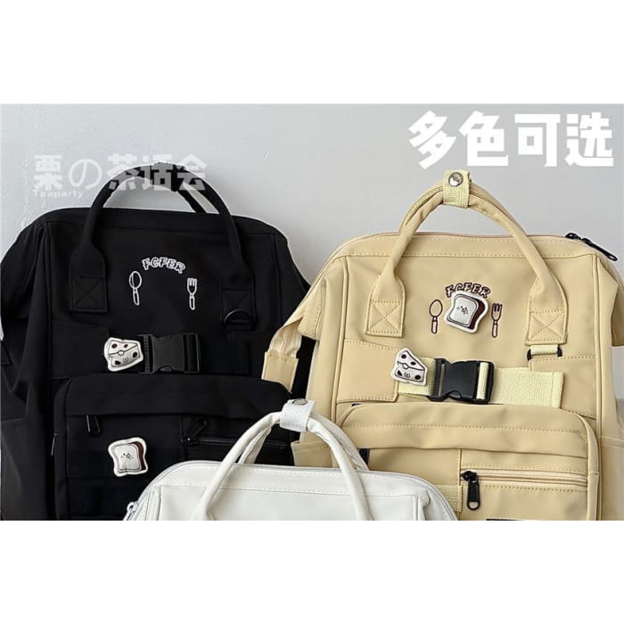 Bread Embroidered Top Handle Buckled Backpack / Charm / Set