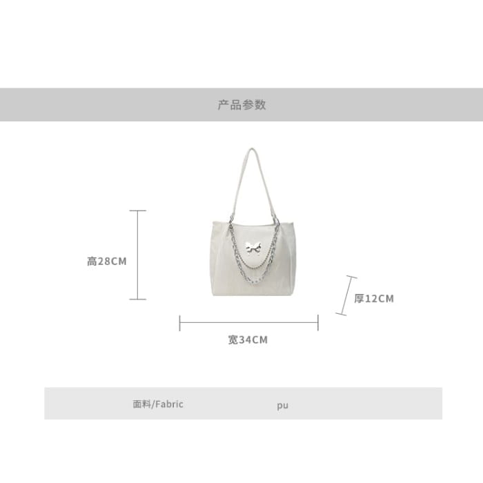 Butterfly Accent Chained Faux Leather Tote Bag