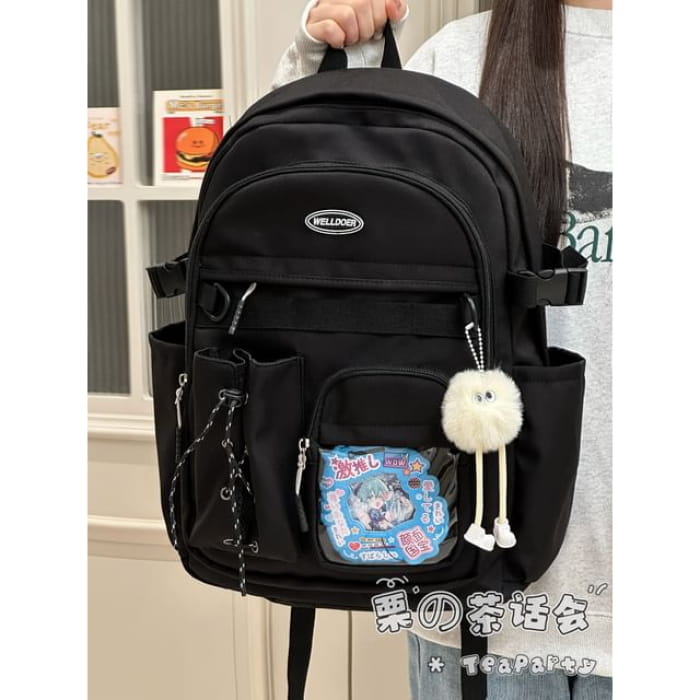 Canvas Zip Backpack - With Pom Charm - Black / One Size