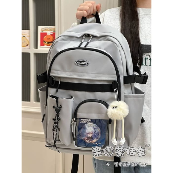 Canvas Zip Backpack - With Pom Charm - Gray / One Size