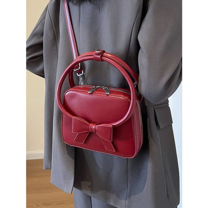 Faux Leather Bow Accent Crossbody Bag