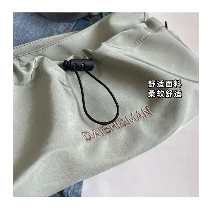 Letter Embroidered Drawstring Crossbody Bag