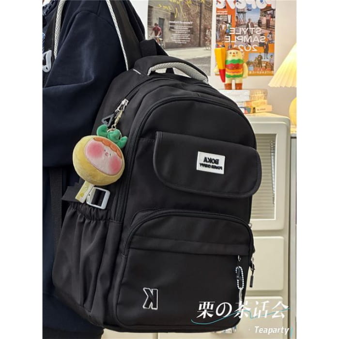 Plain Lettering Logo Buckled Backpack - With Pineapple Face