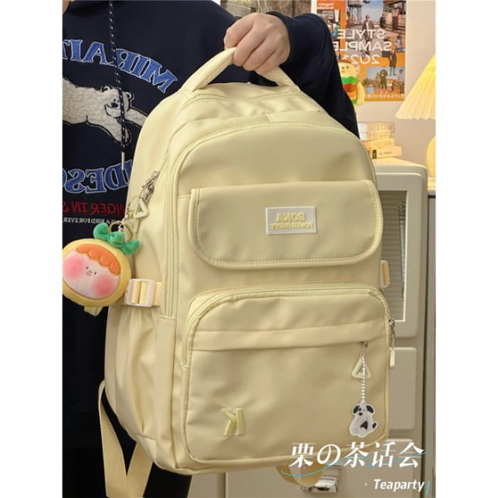 Plain Lettering Logo Buckled Backpack - With Pineapple Face